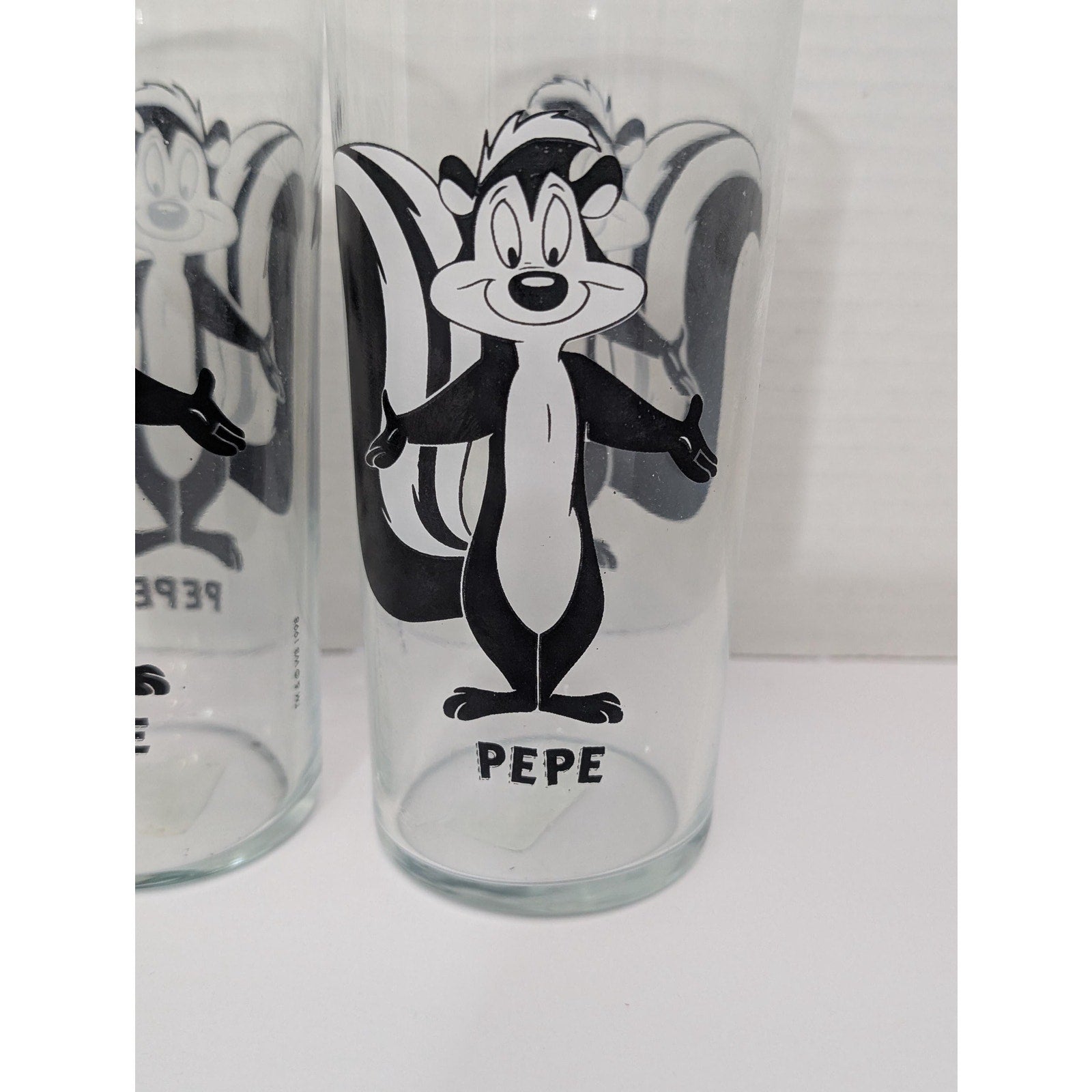 Set of 4 Vintage 1998 Pepe Le Pew Glass Set Looney Tunes Warner Bros Black and White Tumblers