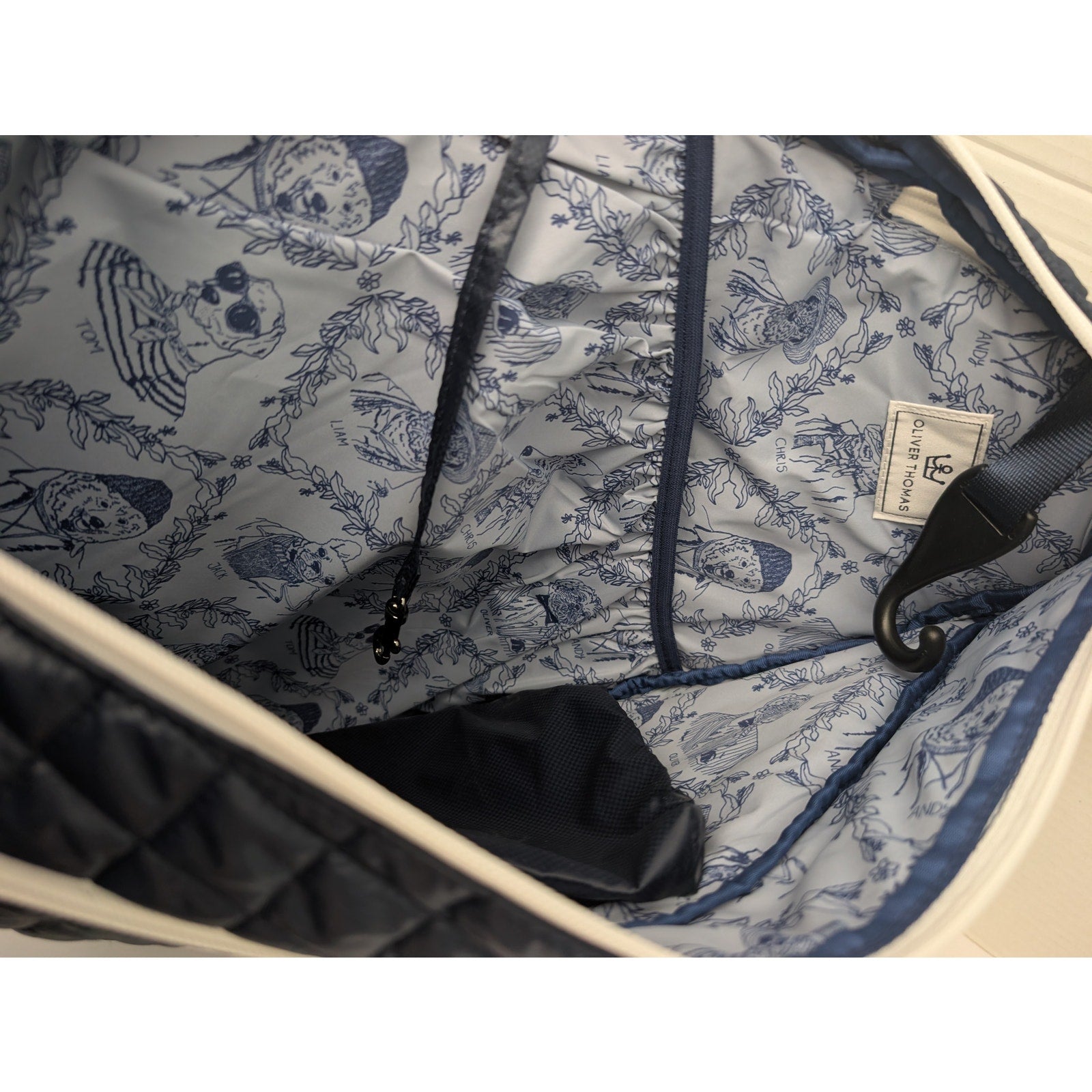 Oliver Thomas Navy Quilted Sling Backpack Dog Print Lining with Pouch